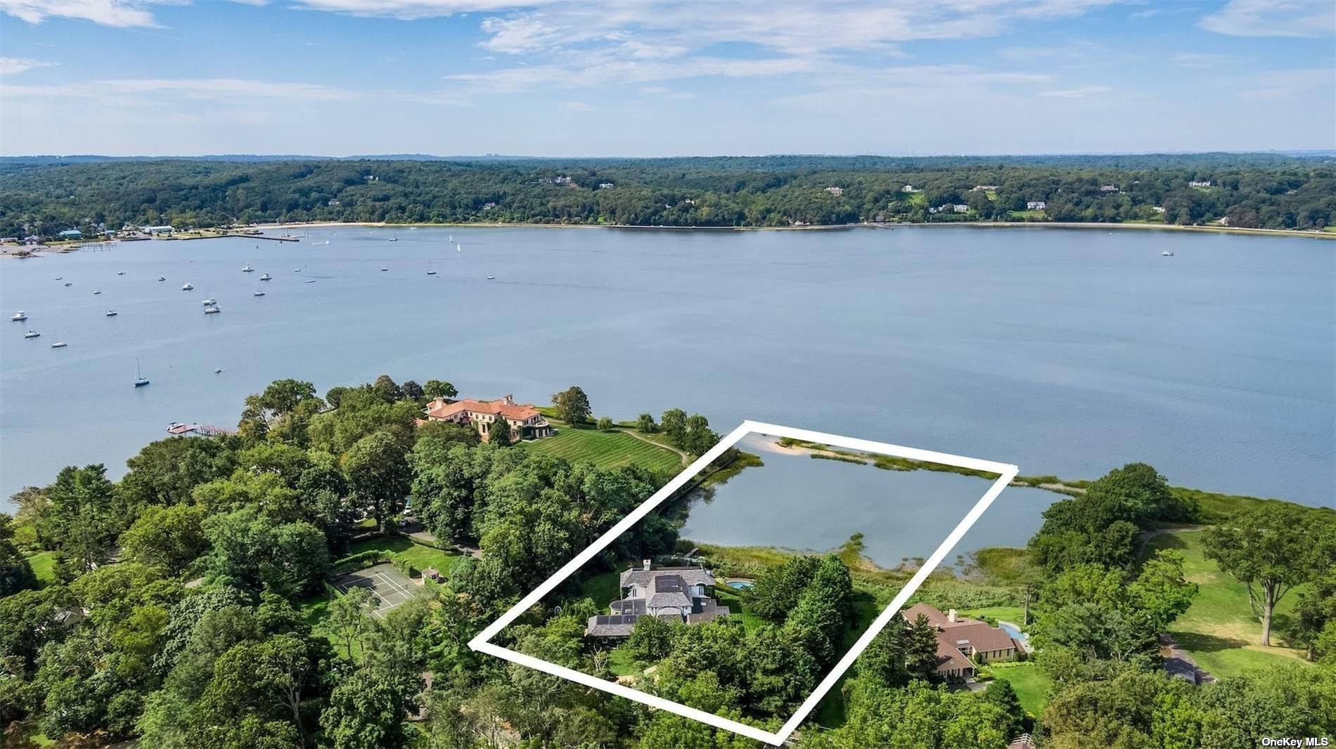 Seaside open air gated estate with studio guest cottage and generator.