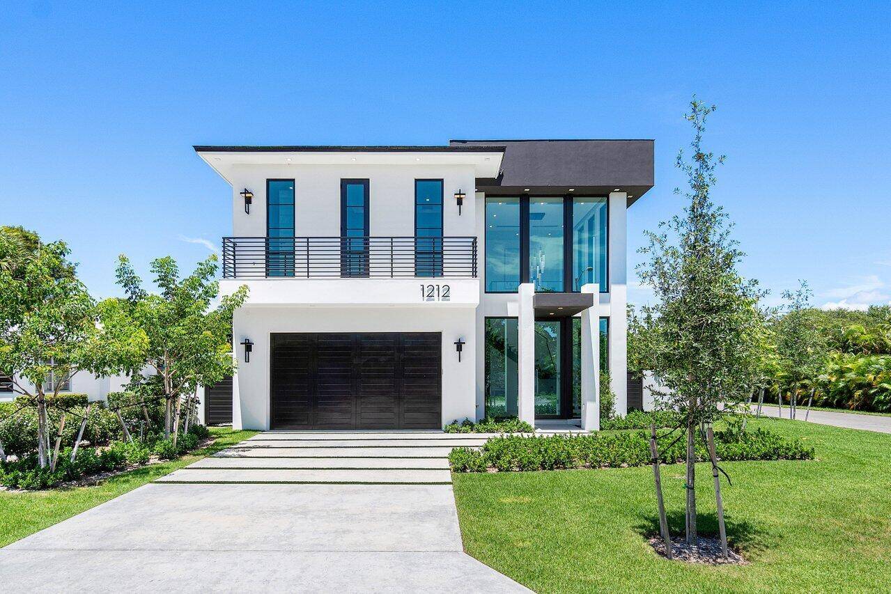 Juniper House, 1212 NE 8th Ave in Delray Beach ; the complete turn key experience in Delray Beach's coveted Palm Trail neighborhood.