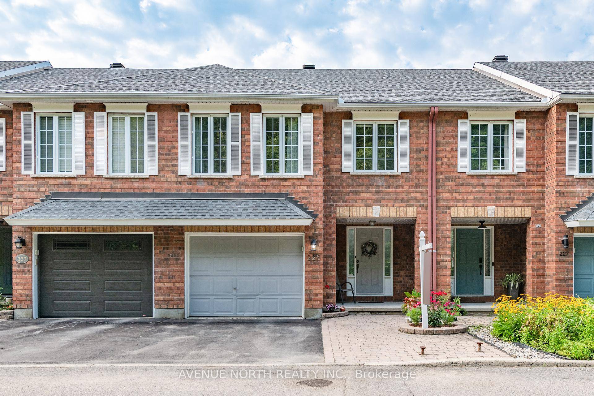 Welcome to 225 Gladeview, a bright turnkey townhome, offering over 1, 700 square feet of stylish living space with NO REAR NEIGHBOURS and backing directly onto a peaceful walking path ...
