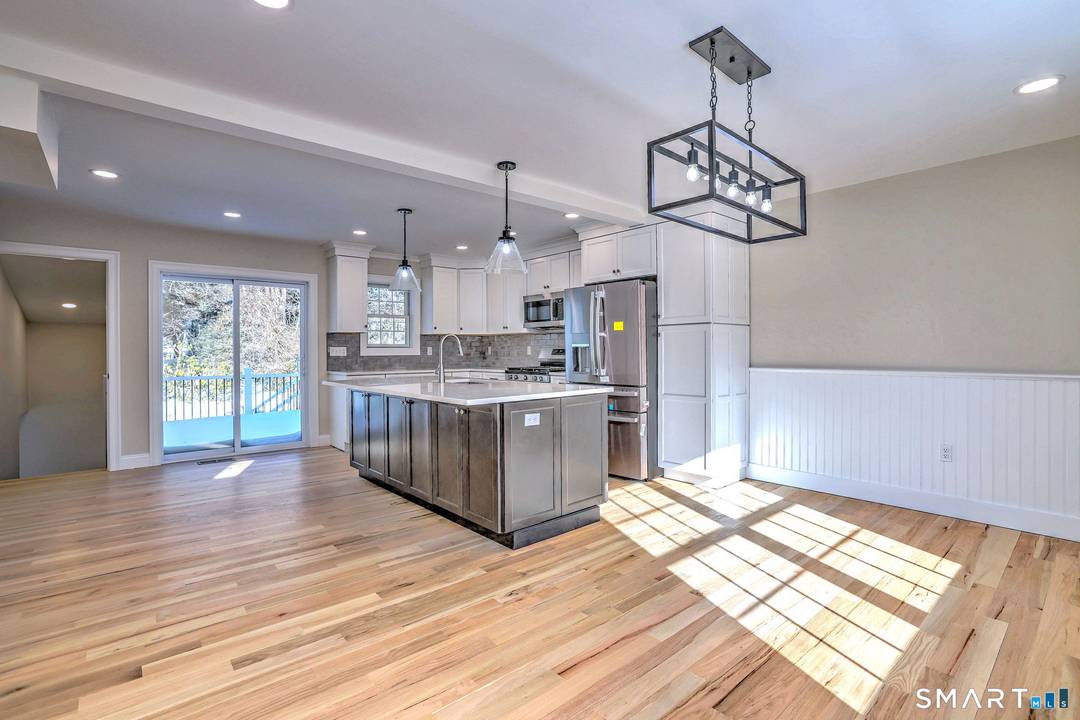 Occupied for nearly 60 years and now offered after complete renovation and expansion, this 3 bedroom, 3.