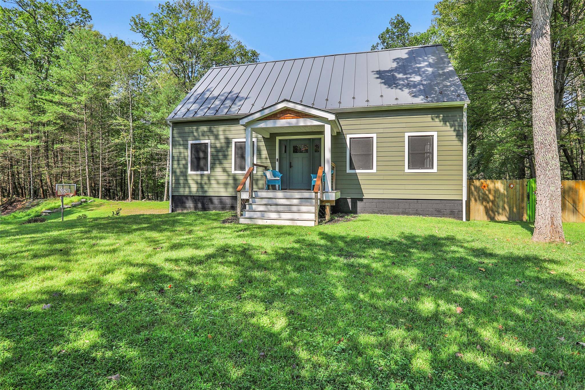 Escape to this beautifully updated 3 bedroom, 2 bath Cape home located in the heart of Olive Bridge.