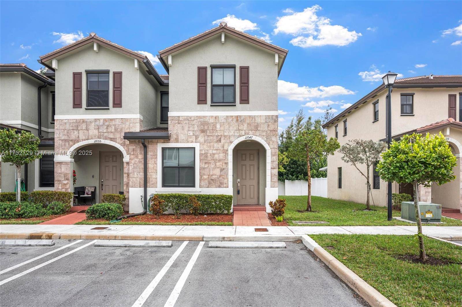 Must see new construction townhouse located in the prestigious Aquabella Community !