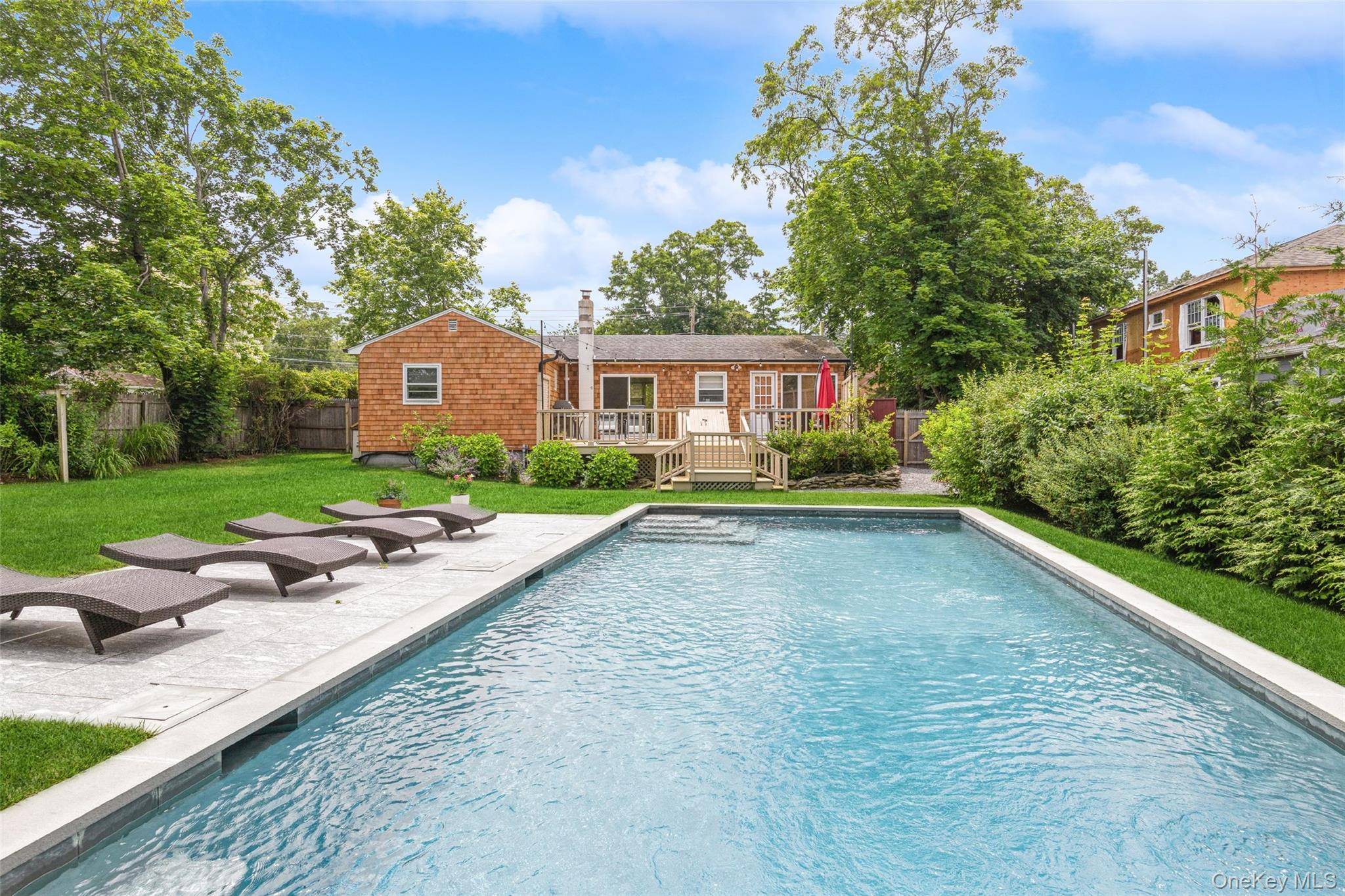 Located just minutes from Sag Harbor Village and Long Beach, this 2 bedroom, 1 bath beach cottage sits on a 0.