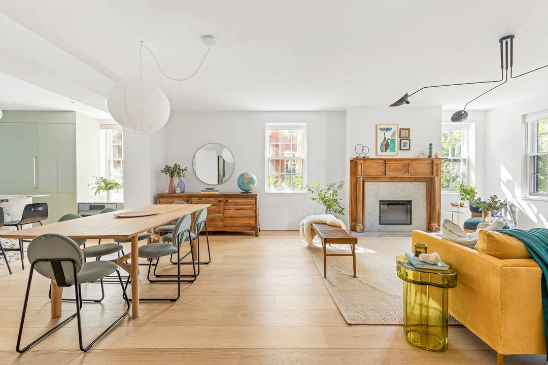 24 Middagh Street is a rare two family Brooklyn Heights compound featuring a fully rebuilt main house, a separate carriage house, and private parking, all centered around a private courtyard.