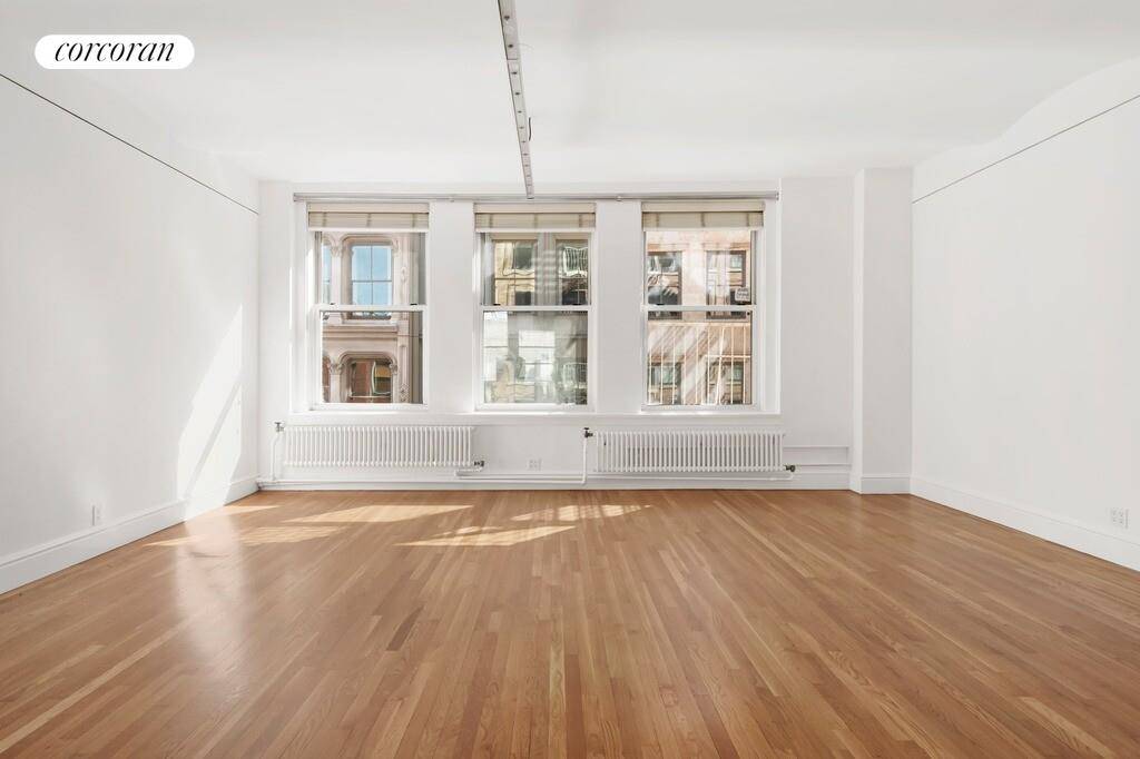 Classic Tribeca Loft Living with Exceptional Light and Character 45 Lispenard Street 4E is a rare and authentic loft residence spanning approximately 1, 800 square feet, defined by volume, light, ...
