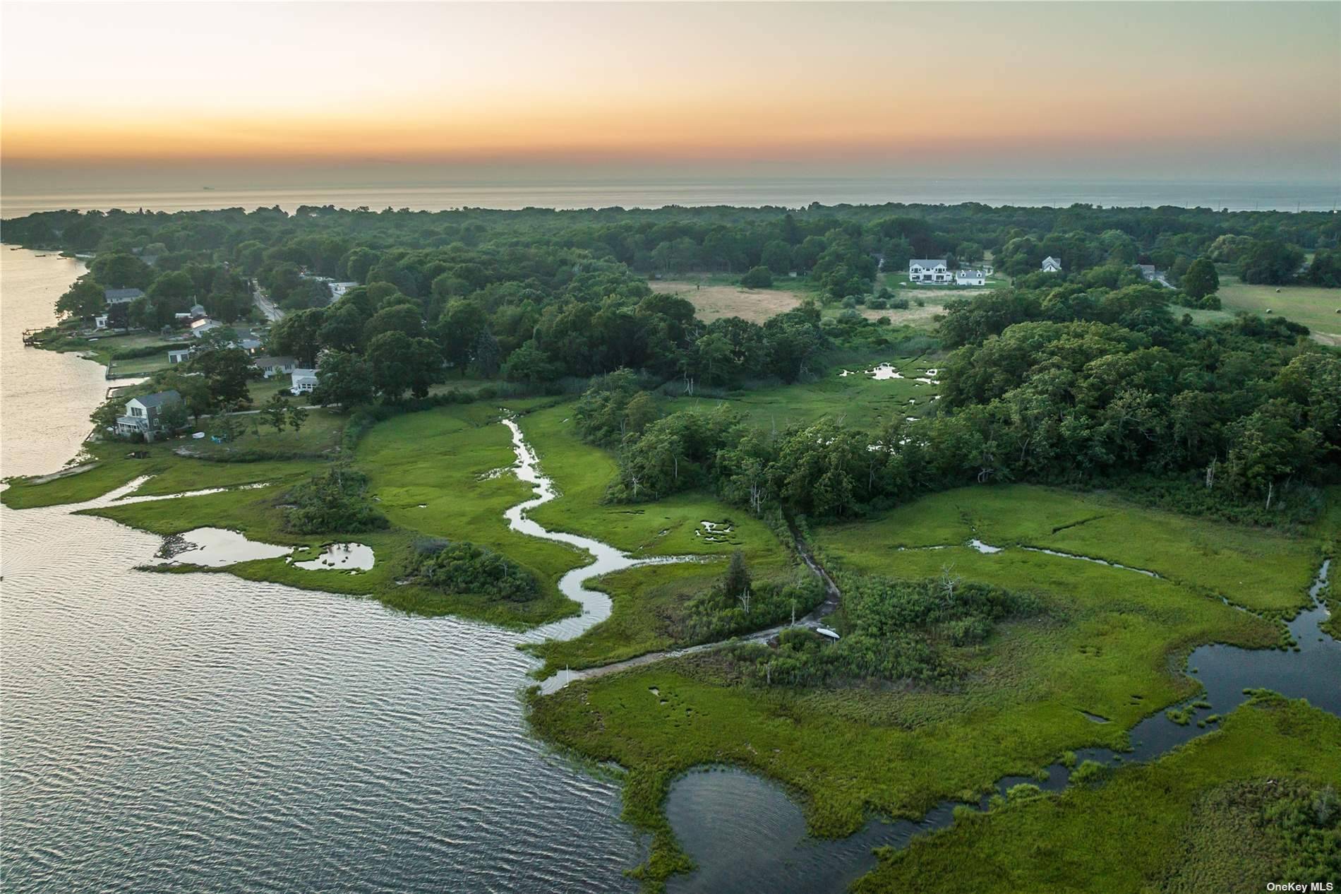 Down a graceful country road, on the North Fork of Long Island your dream home awaits.