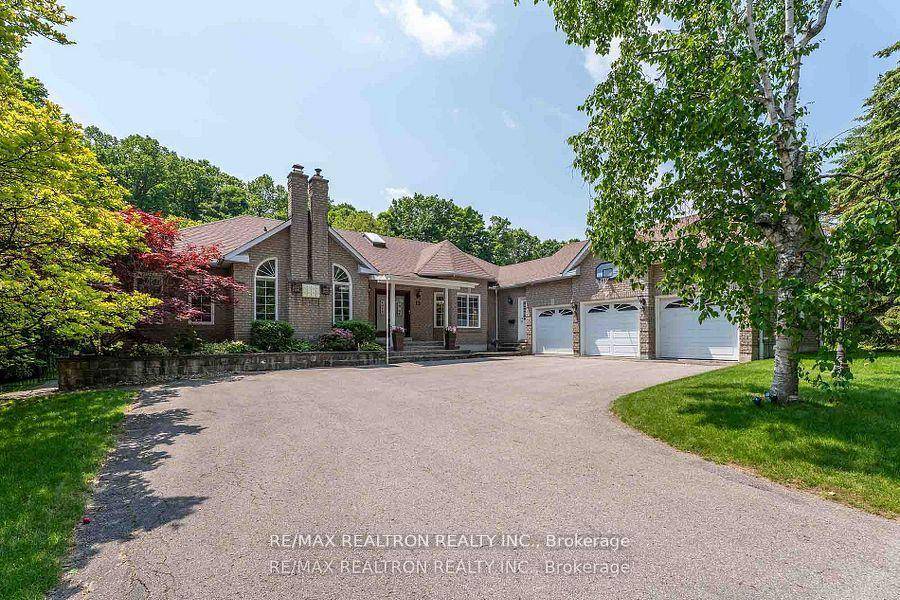 Welcome to this exceptional executive bungalow, perfectly situated on one of the most coveted lots in a premier, sought after neighborhood.