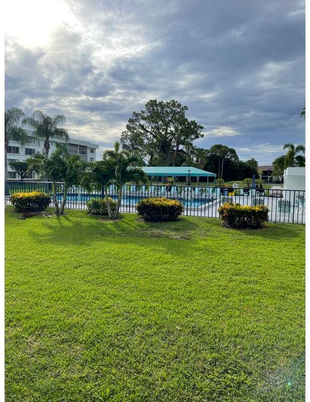 Ground level condo unit, with a spacious floor plan, walk in closets, and a covered patio.