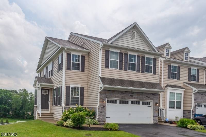 Recently constructed end unit townhome, is a modern masterpiece !