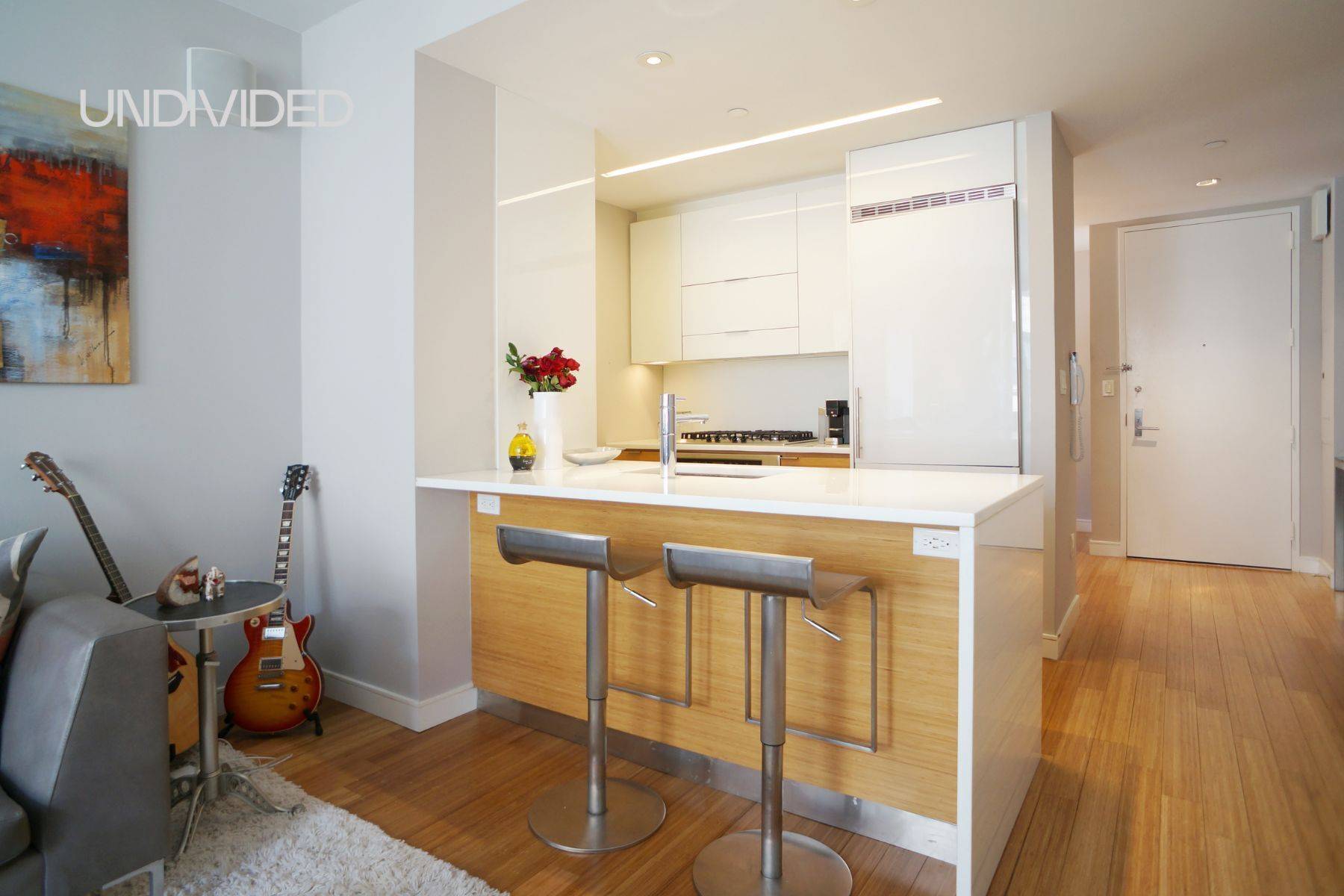 Residence 6F at 303 East 33rd Street offers approximately 874 square feet of modern, corner living with bright, north and east exposures.