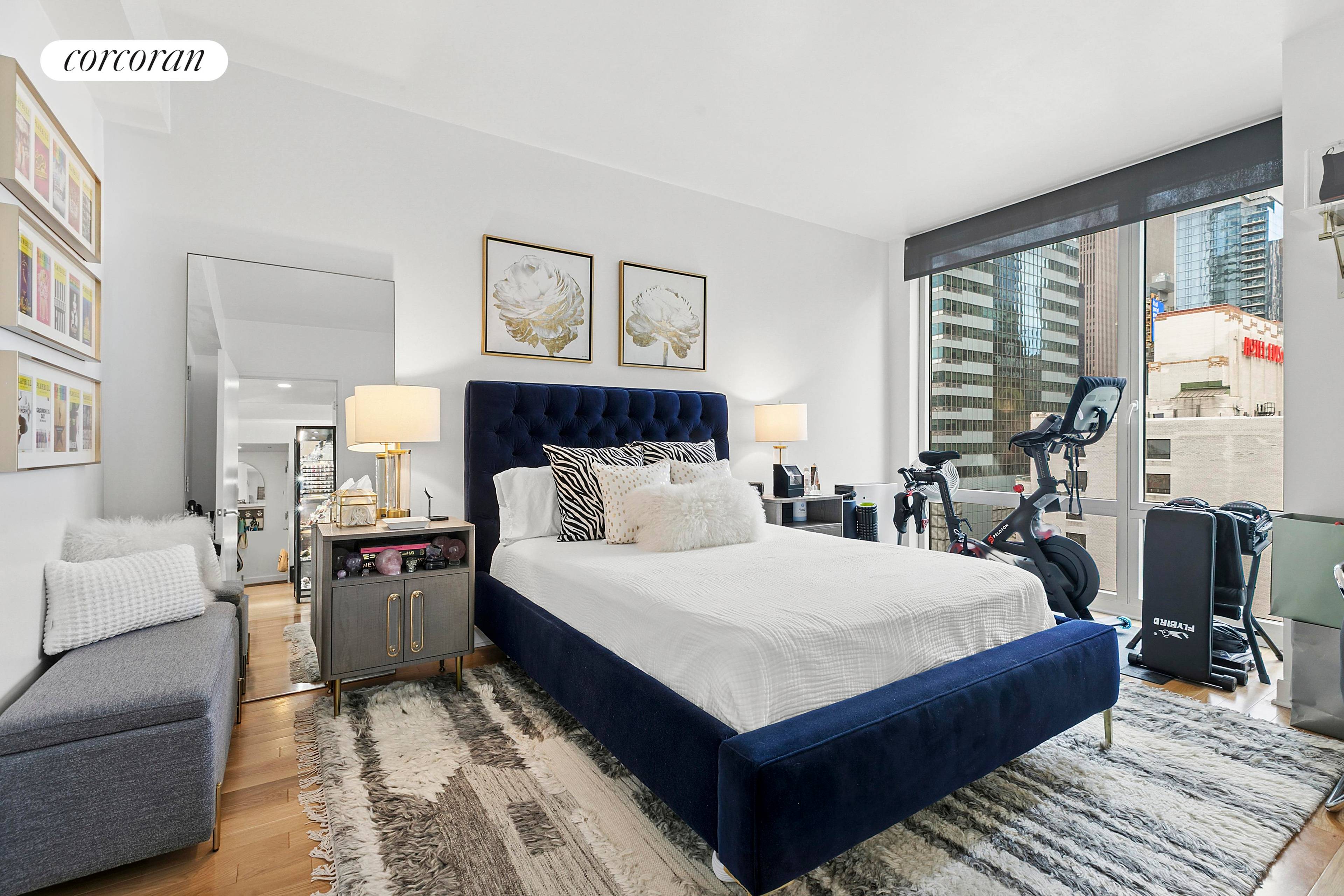 Residence 2005 at 247 West 46th Street, The Platinum Condominium, is a luxury spacious and bright one bedroom apartment with central air conditioned, Thermador appliances and Washer and Dryer.
