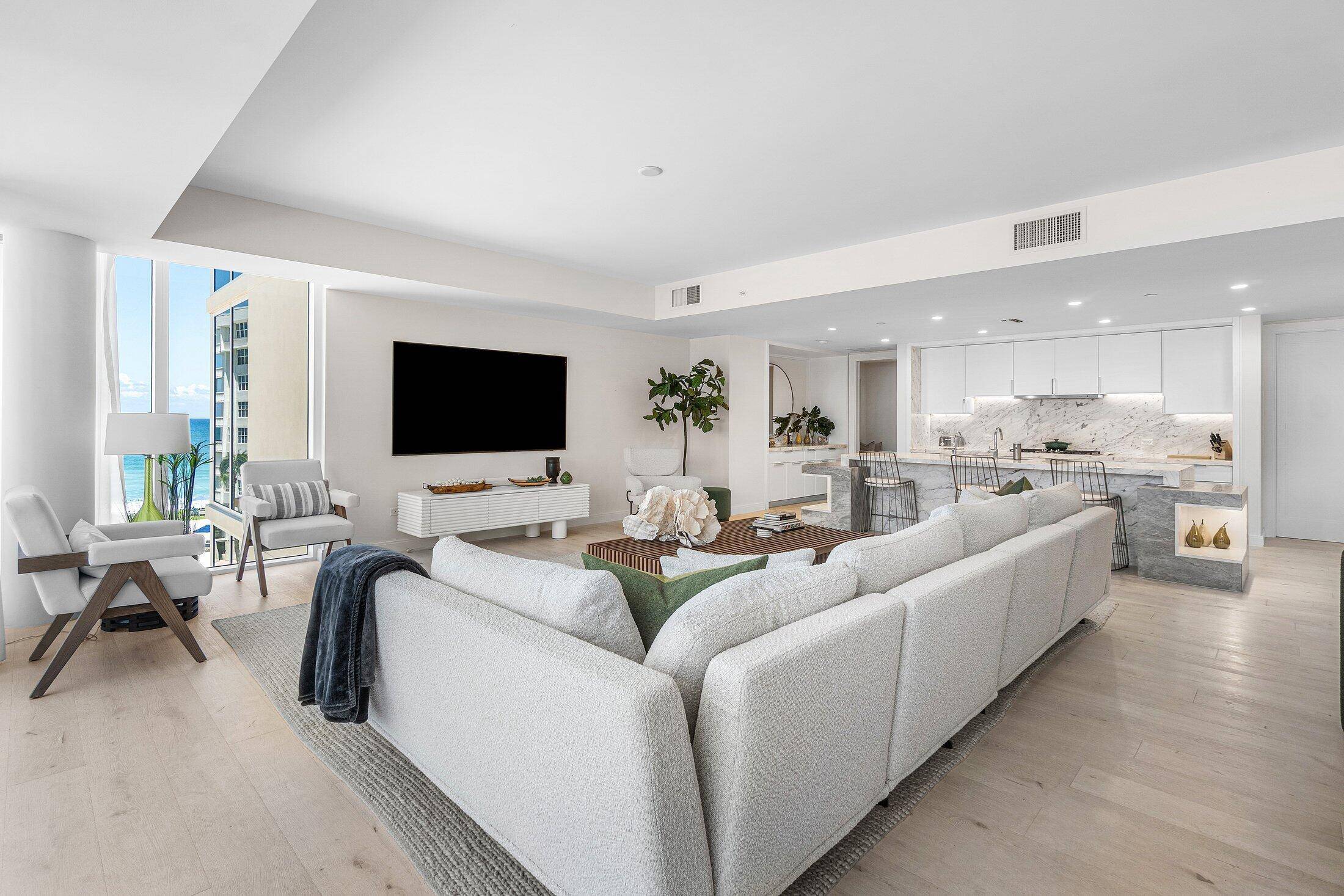 Discover sophisticated contemporary elegance in this stunning beachfront condominium.