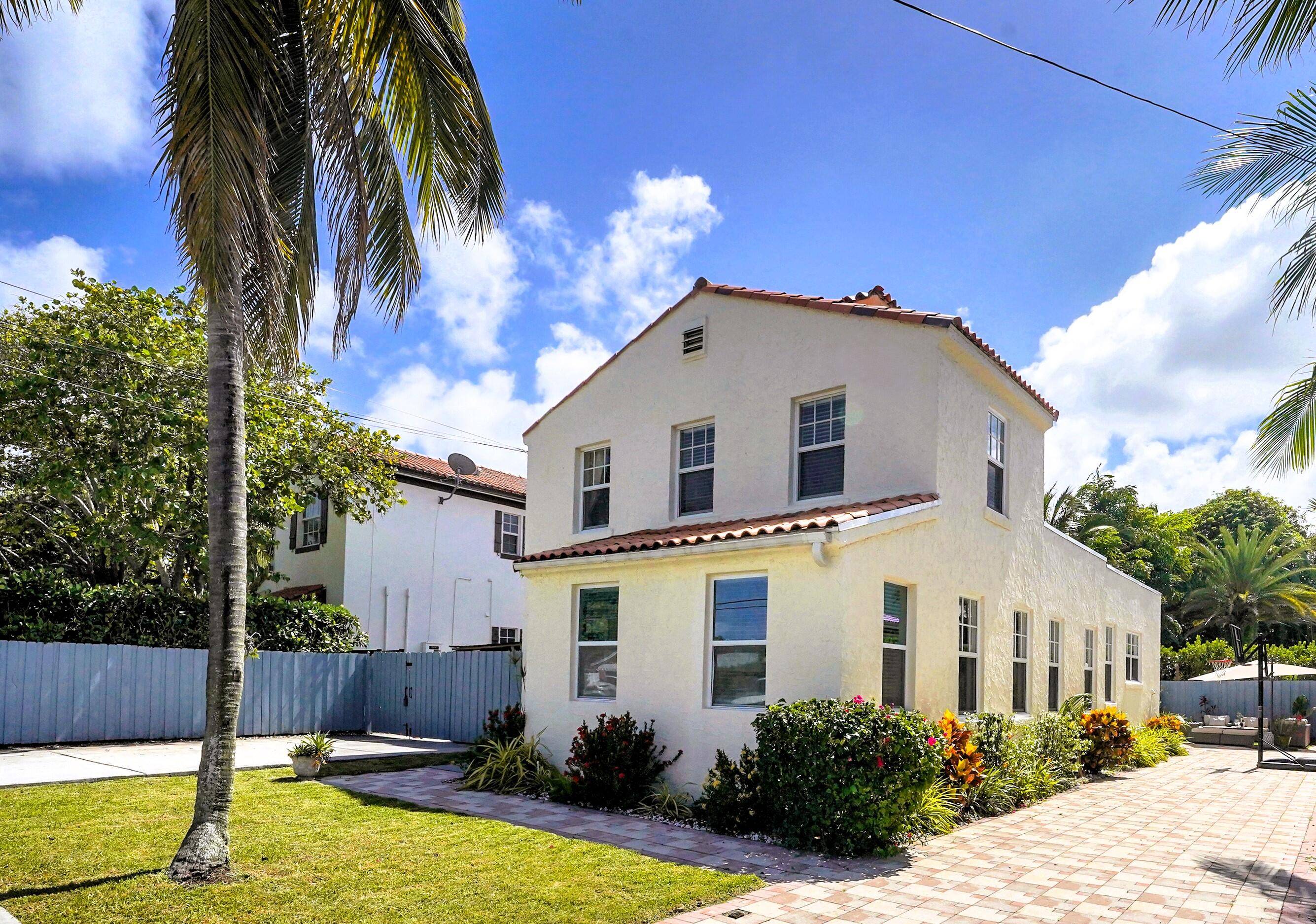 Charming and Historic, this beautifully preserved home is ideally located just a few blocks from vibrant Atlantic Avenue and Delray Beach's stunning coastline.