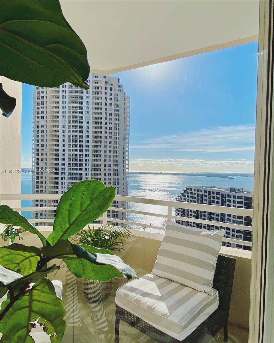 Enjoy exclusive island living in this beautifully remodeled 2BR 2 BA condo at One Tequesta Point on Brickell Key.
