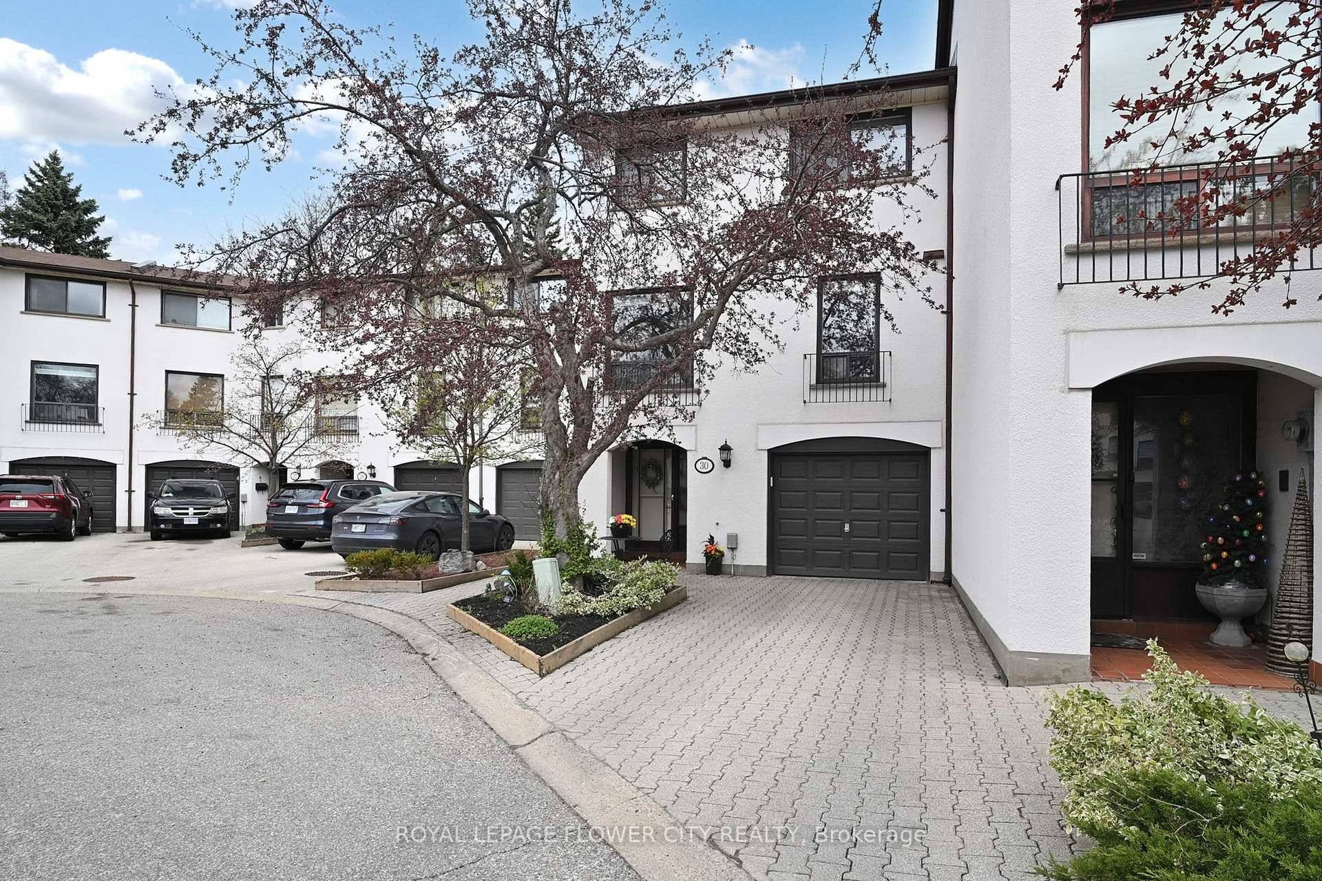 Beautiful Luxury Townhouse located in a Mediterranean Style Complex.