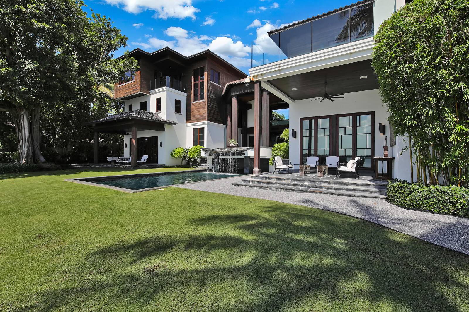 Lake to Oceanfront Polynesian RetreatA very special large Ocean and Lakefront compound with wonderful Atlantic and Intracoastal views.