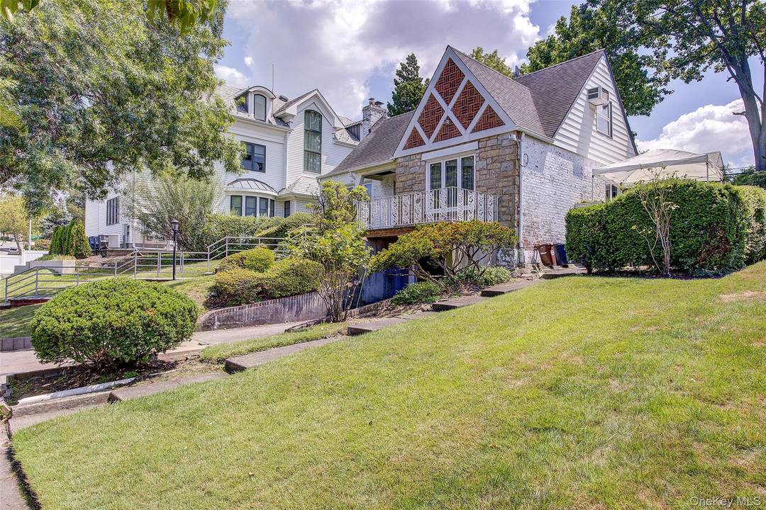 Rare 6, 000 Sf Lot in Heart of Kew Garden Hills Offer an Expanded Cape with Four Bedrooms, Two Full Bath and Two Half Bath, Jacuzzi, Eat in Kitchen, Living ...