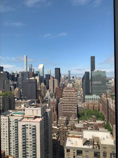 Breathtaking Masterpiece will delight even the most discerning renter Beautifully renovated high end 1546 SF combined apartment on the 52nd floor of the Corinthian Condominiums.