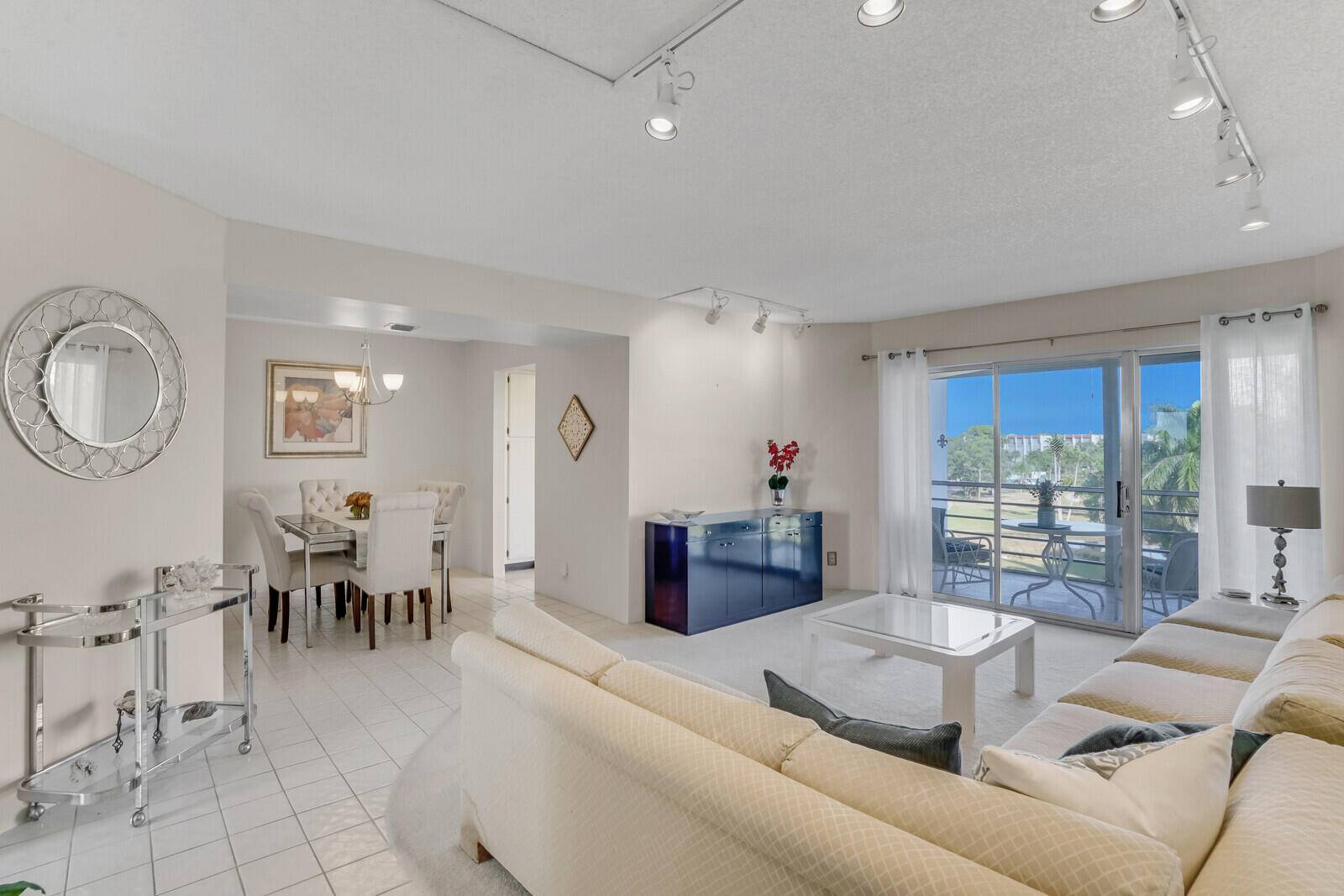 Welcome to 3595 Birdie Drive 305, a light and bright 2 bedroom, 2 bathroom condo offering serene views of the golf course, pond, and pool.