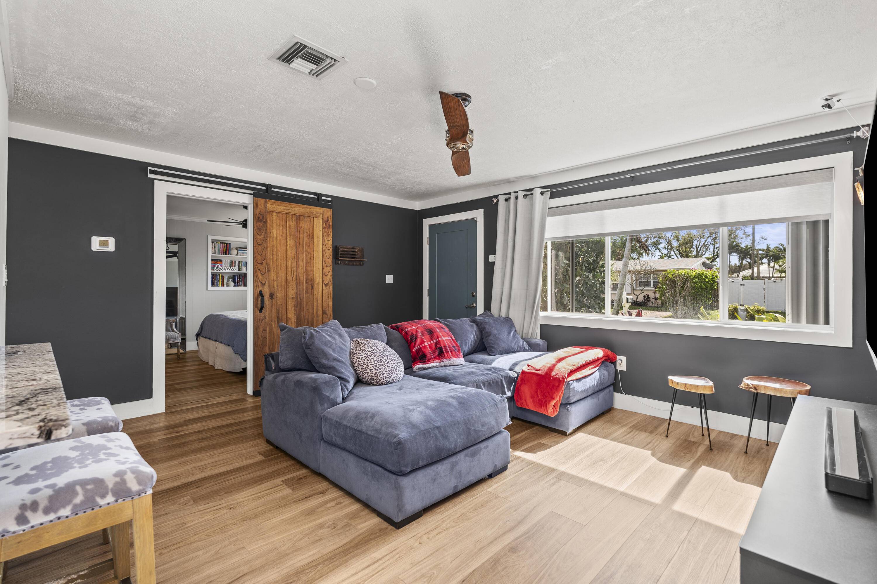 A beautifully updated 3 bedroom, 2 bathroom CBS home with a versatile bonus room perfect for a man cave, office, or guest space.