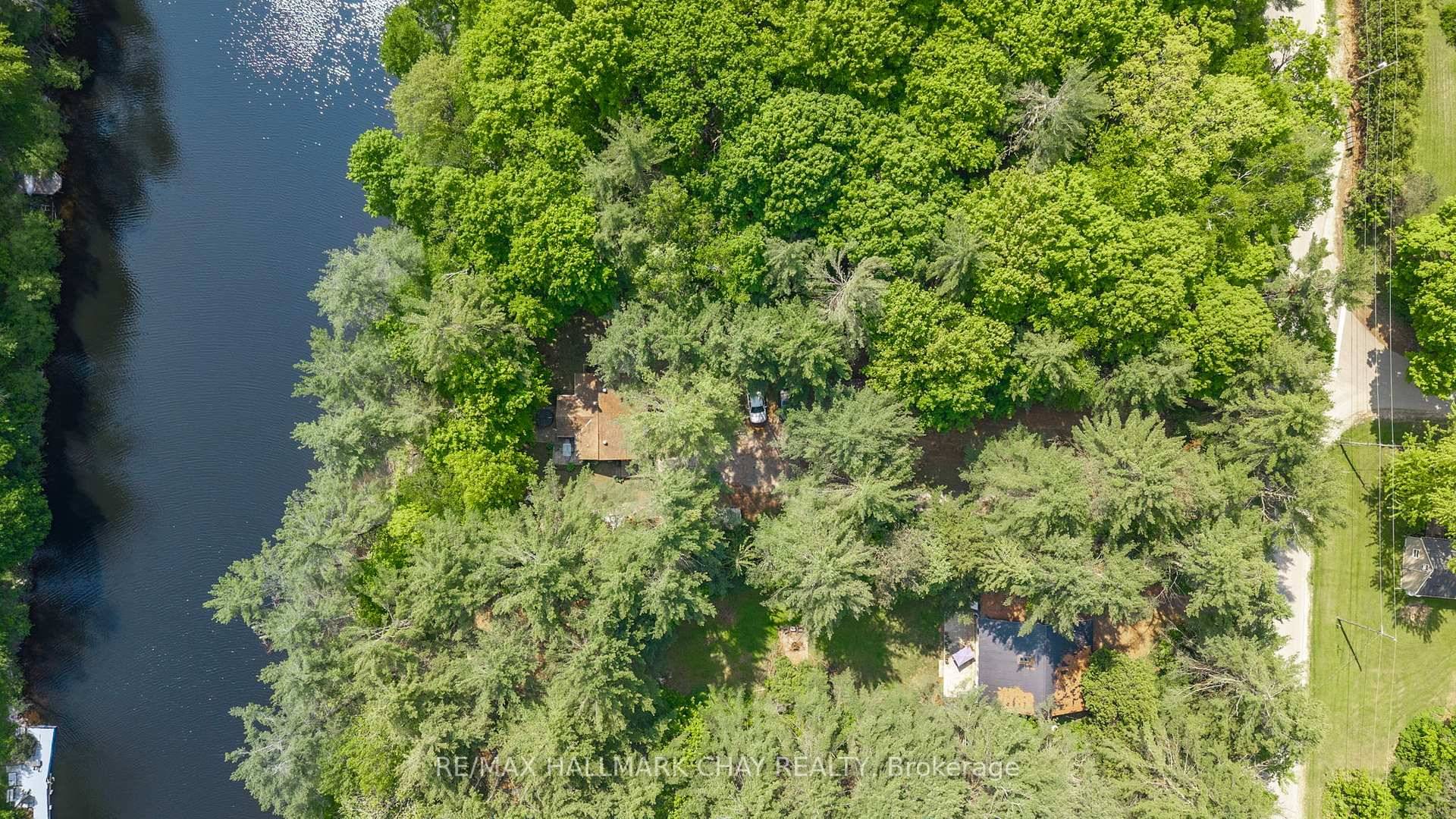 Escape to peace and privacy at this serene all season waterfront home nestled along the stunning Severn River.