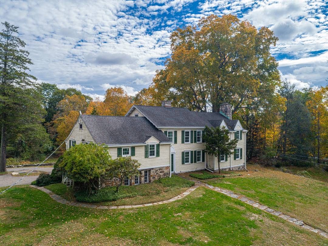 Property is being sold As Is This home full of charm and character, sits on excellent lot with pool and tennis court sites, Historic charm across the street Mianus River ...