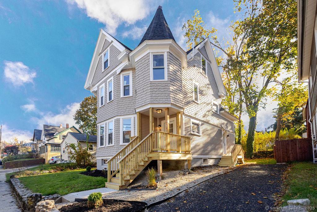 Welcome to 7 Florence Street, a beautifully restored Queen Anne style home that perfectly blends classic architecture with modern comfort.