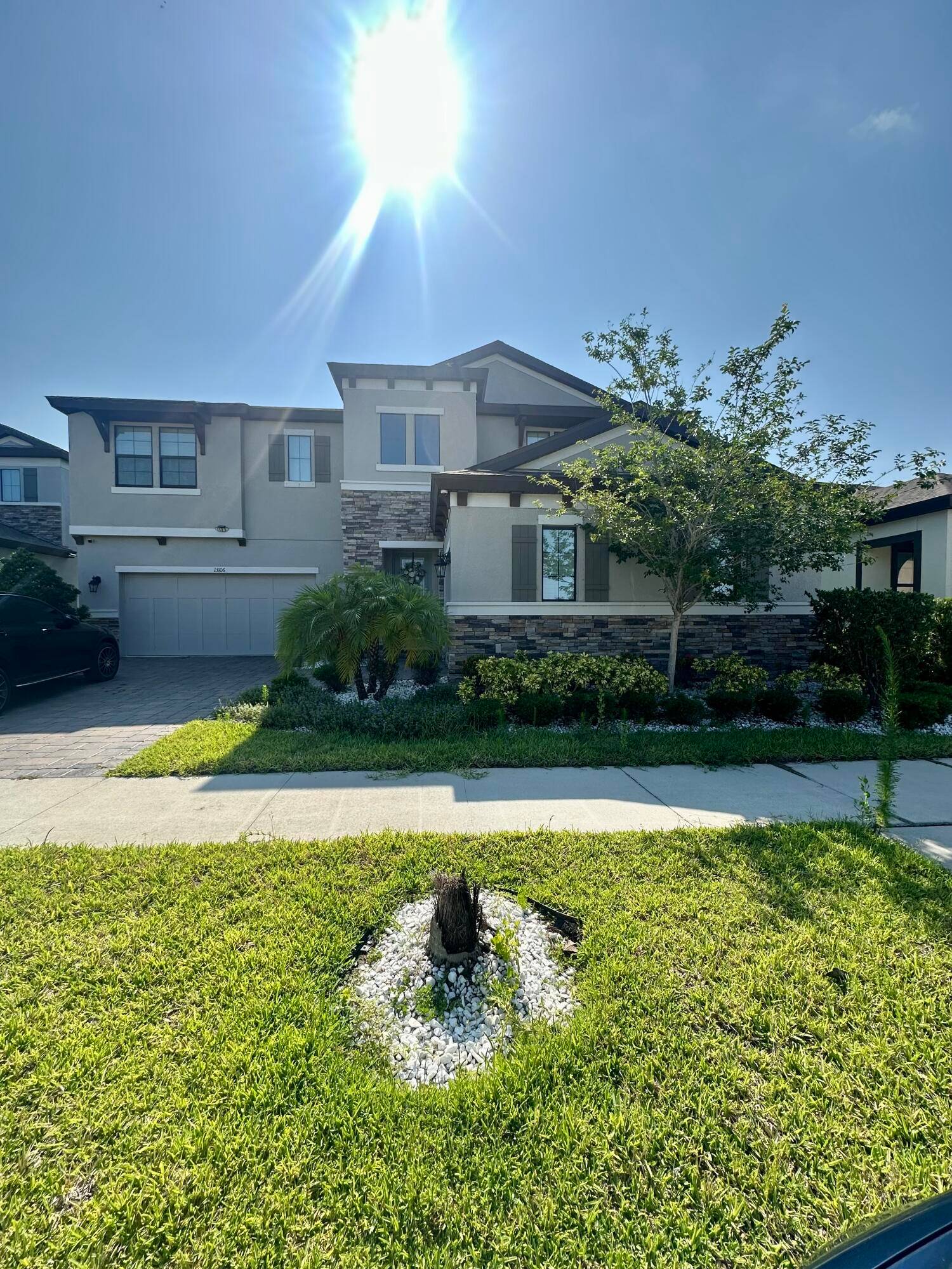 Fully upgraded, the Belmar impresses with its two story volume ceiling in the foyer, which opens to the den, dining room and the split garage entrances.
