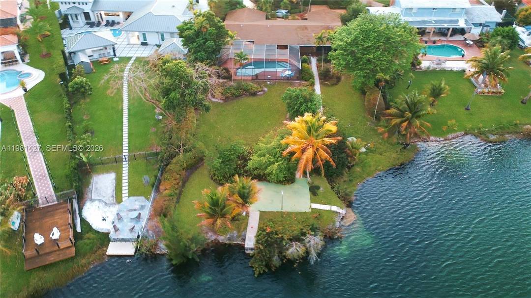 Lakeside oasis on sought after rarely available Bluebird Lake.