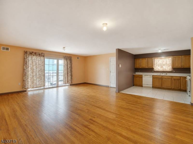 Recently constructed, income producing 2 family home offering abundant natural light, and superb commuter convenience.