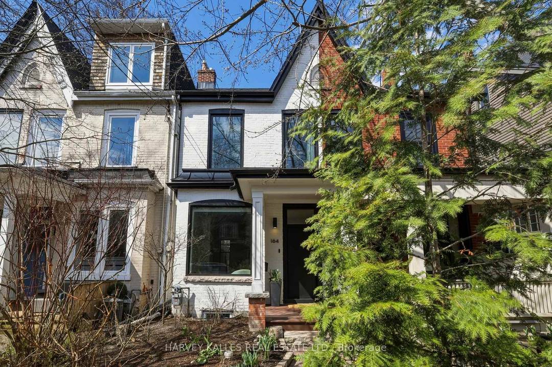 Stunning Turnkey Annex Home On Charming Tree Lined One Way Street.