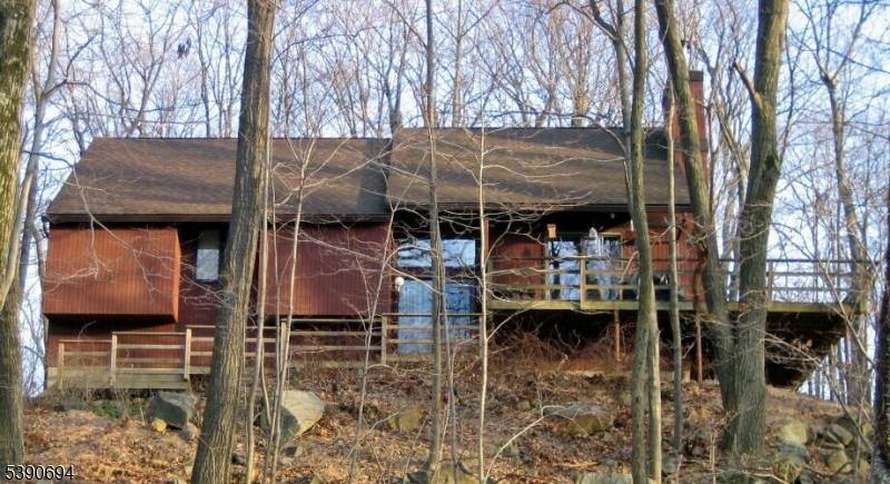 Welcome nature lovers to this very private Custom Contemporary Long Valley home in a beautiful rustic setting.
