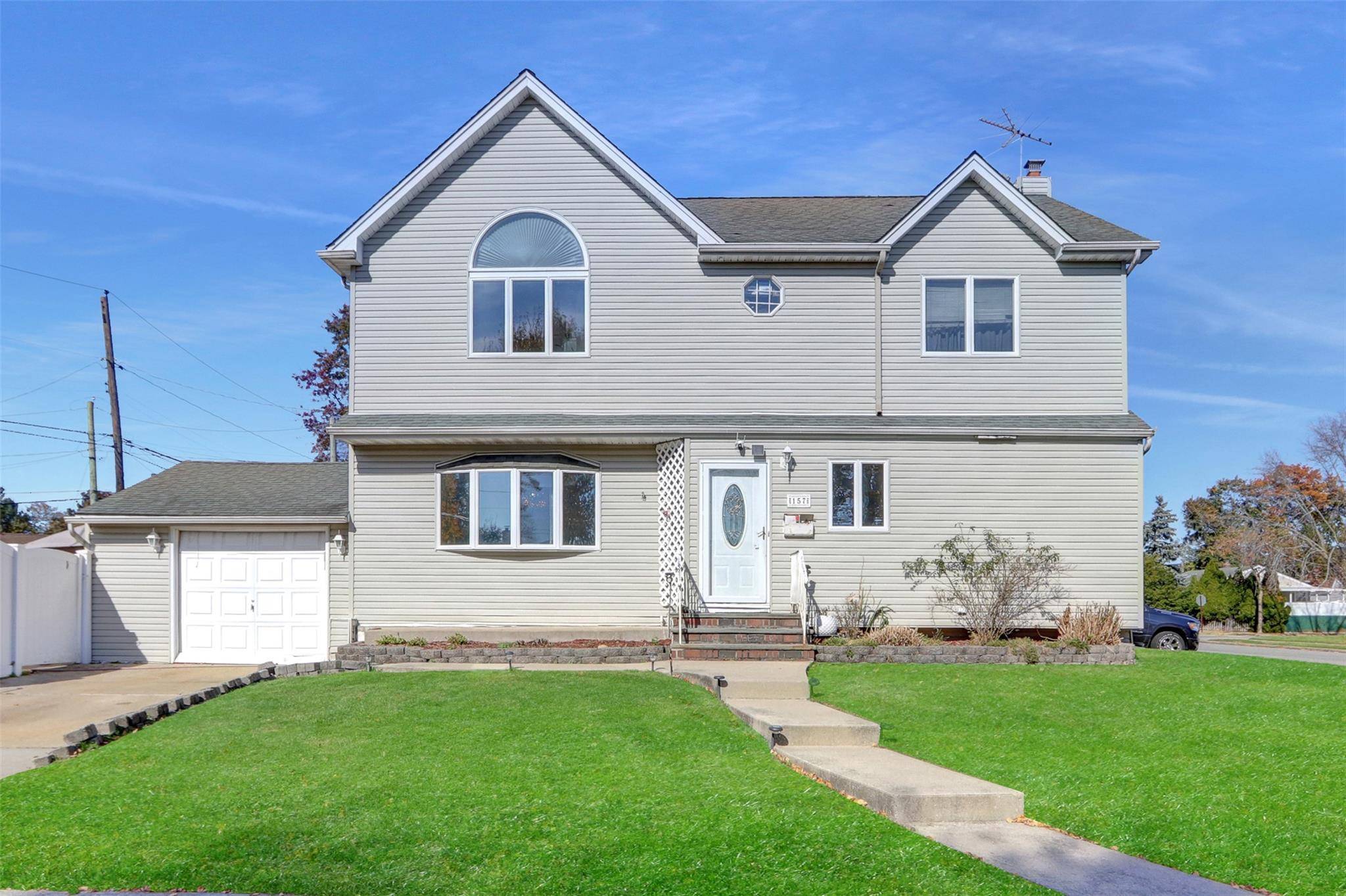Location Location Location A beautiful Colonial 2 Story House the front and back offering a perfect blend of luxury, privacy, and tranquility.