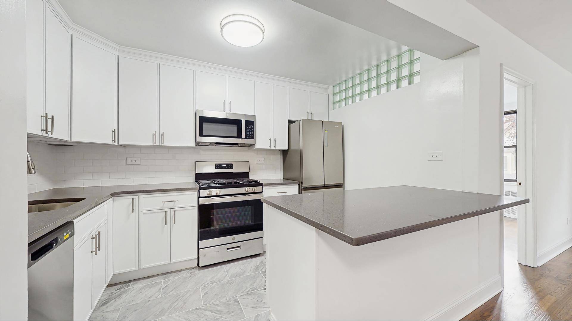 Welcome to an exceptional living experience at 599 East 7th Street, Unit 2B !