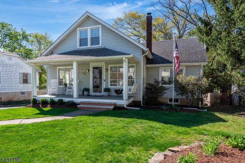 Welcome to this beautifully updated 4 bedroom cape where classic charm meets modern convenience.