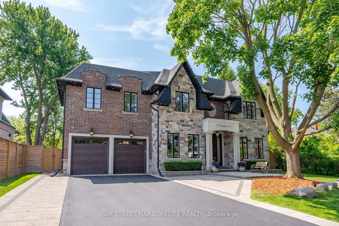 This stunning custom residence sits on a private 75 x 150 ft lot with rare southern exposure, offering nearly 5, 100 sq ft of refined living space.