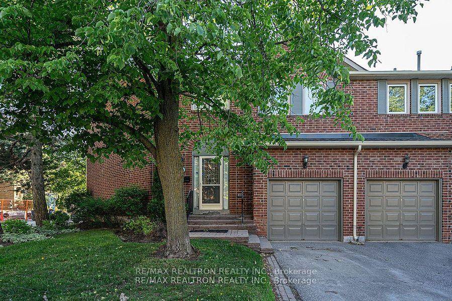 Location, Location, Location, This wonderful laid out large 3 1 bedroom end unit townhome features tons of natural light, excessive amounts of storage space and hardwood floors.