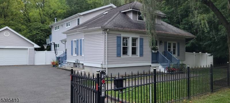 Beautiful five bedroom, three and a half bath home featuring a gourmet kitchen, a sunny living room, and a formal dining room.