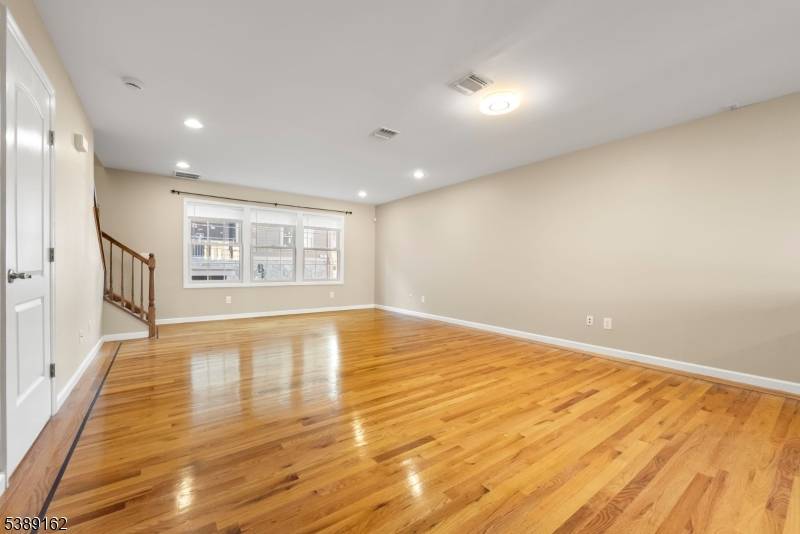 This immaculate townhome offers over 1, 600 SF of modern living across three thoughtfully designed levels.