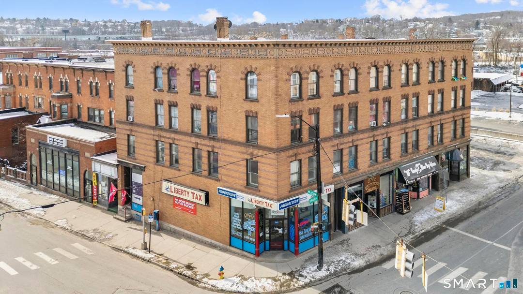 Exceptional mixed use investment opportunity Downtown featuring three contiguous parcels totaling 0.