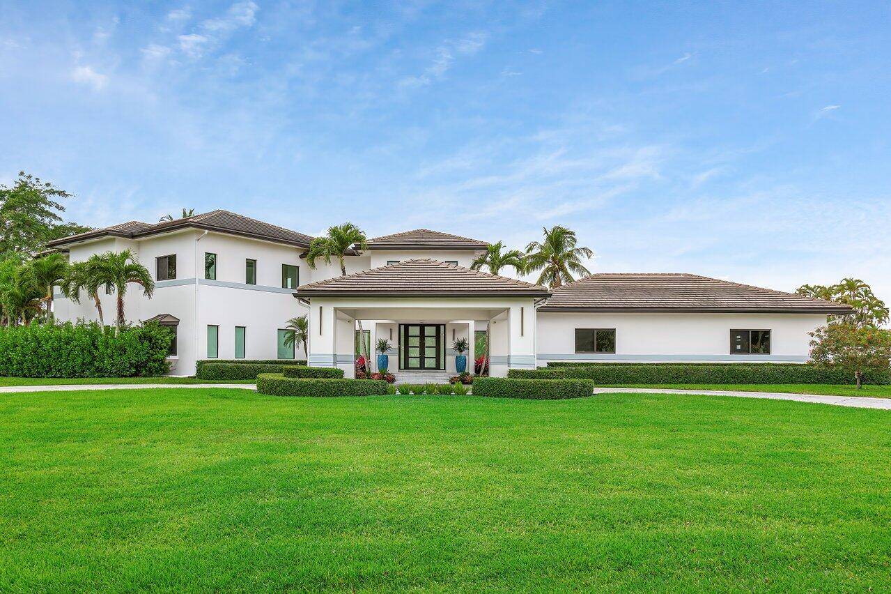 Discover a stunning blend of contemporary opulence and serene resort style living at 8387 Sawpine Rd, a meticulously reimagined estate nestled within the exclusive gated community of Delray Lake Estates.