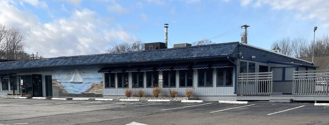 FOR LEASE approximately 5, 400 sq ft on US Route 1 of recently renovated restaurant space, including huge outdoor deck with outdoor bar area.