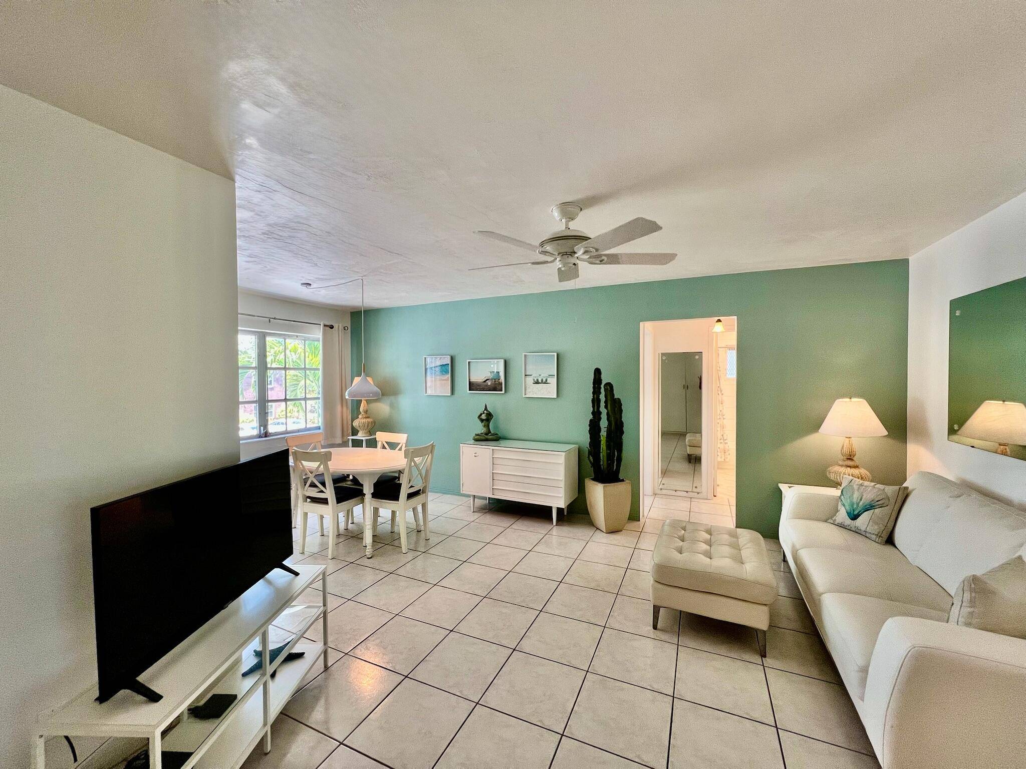 Investor Alert ! Beautifully furnished and turnkey corner unit in a quiet 11 unit community.