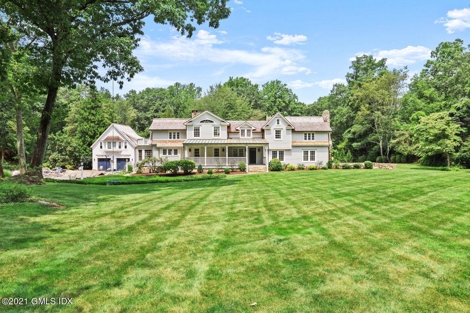 This picturesque farmhouse sits on 2.