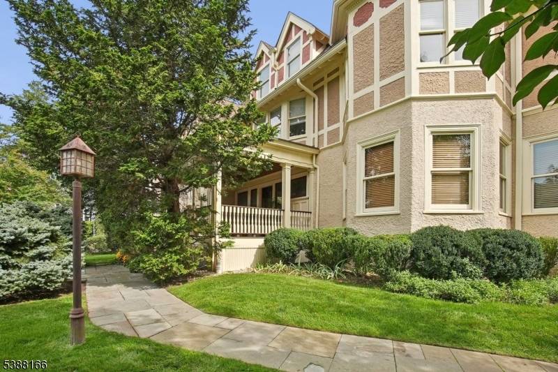 Old World Elegance Meets Modern Living Welcome to this exceptional 6 bedroom, 4 full bath, 2 half bath Victorian in the heart of Summit.