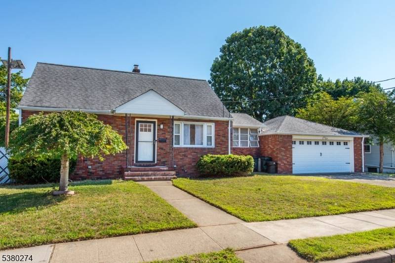Welcome home to this beautifully renovated 4 bedroom, 2 bathroom Cape featuring a modern kitchen with sleek finishes, stainless steel appliances, and an open layout perfect for entertaining.
