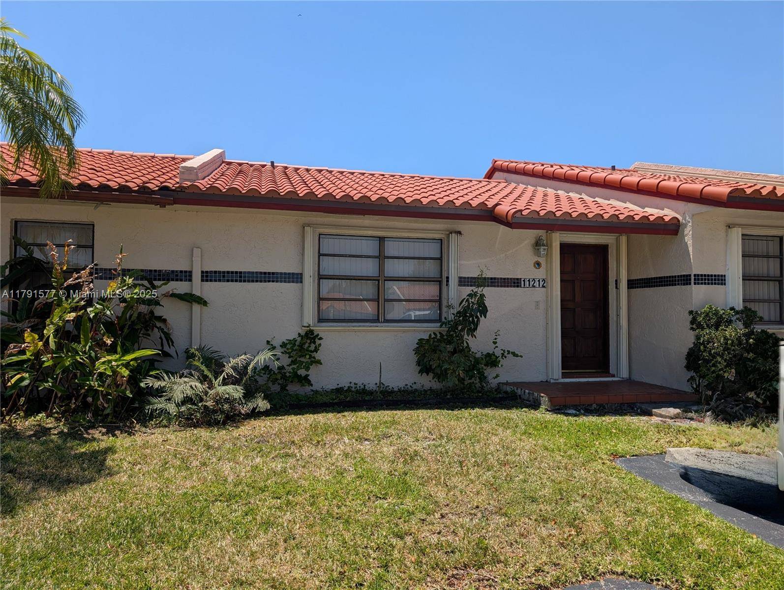 One story 2 2 Townhouse nestled in a beautifully kept, open layout community.