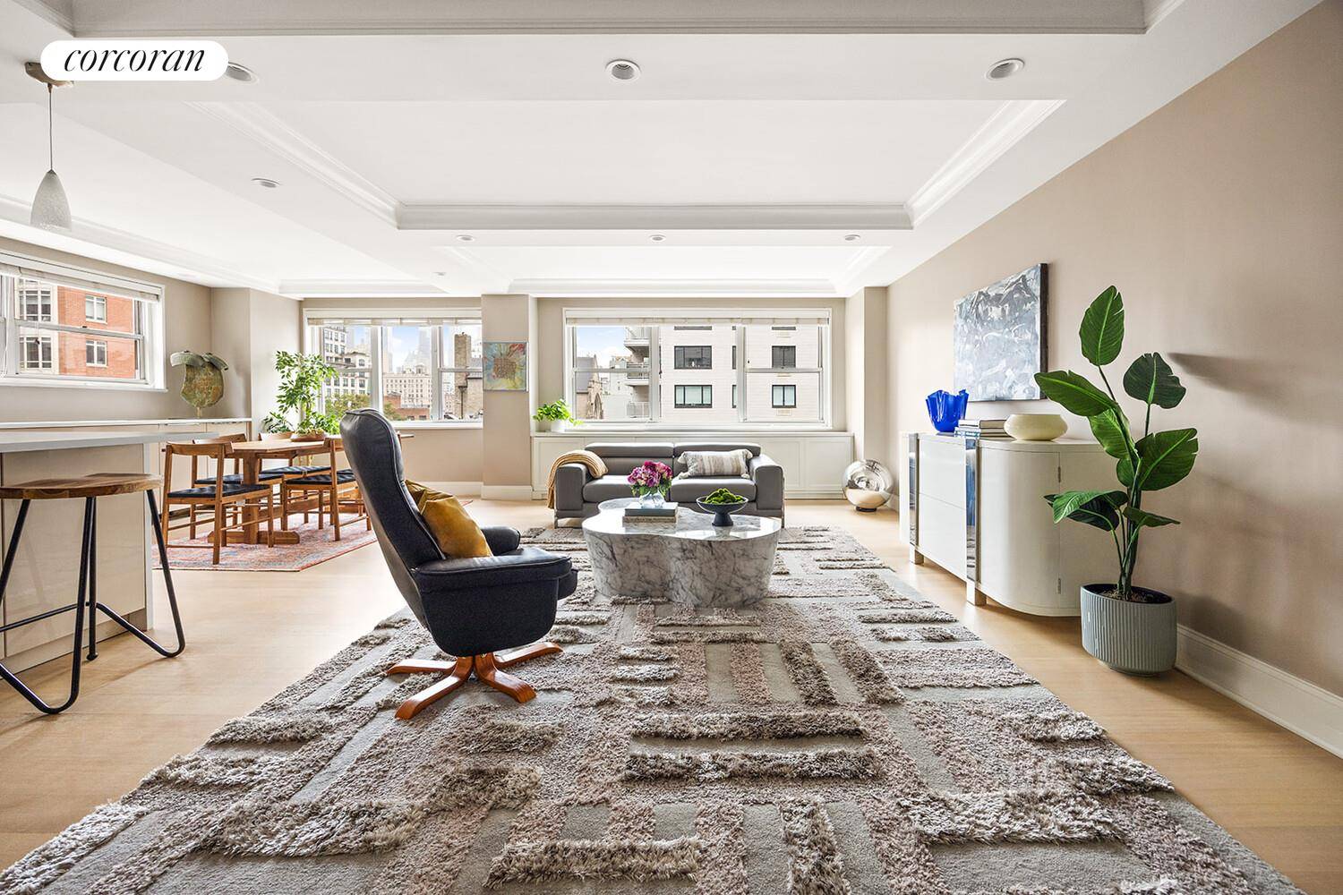 This elegantly renovated home features an open concept layout with south and west facing windows that flood the space with natural light throughout the day.