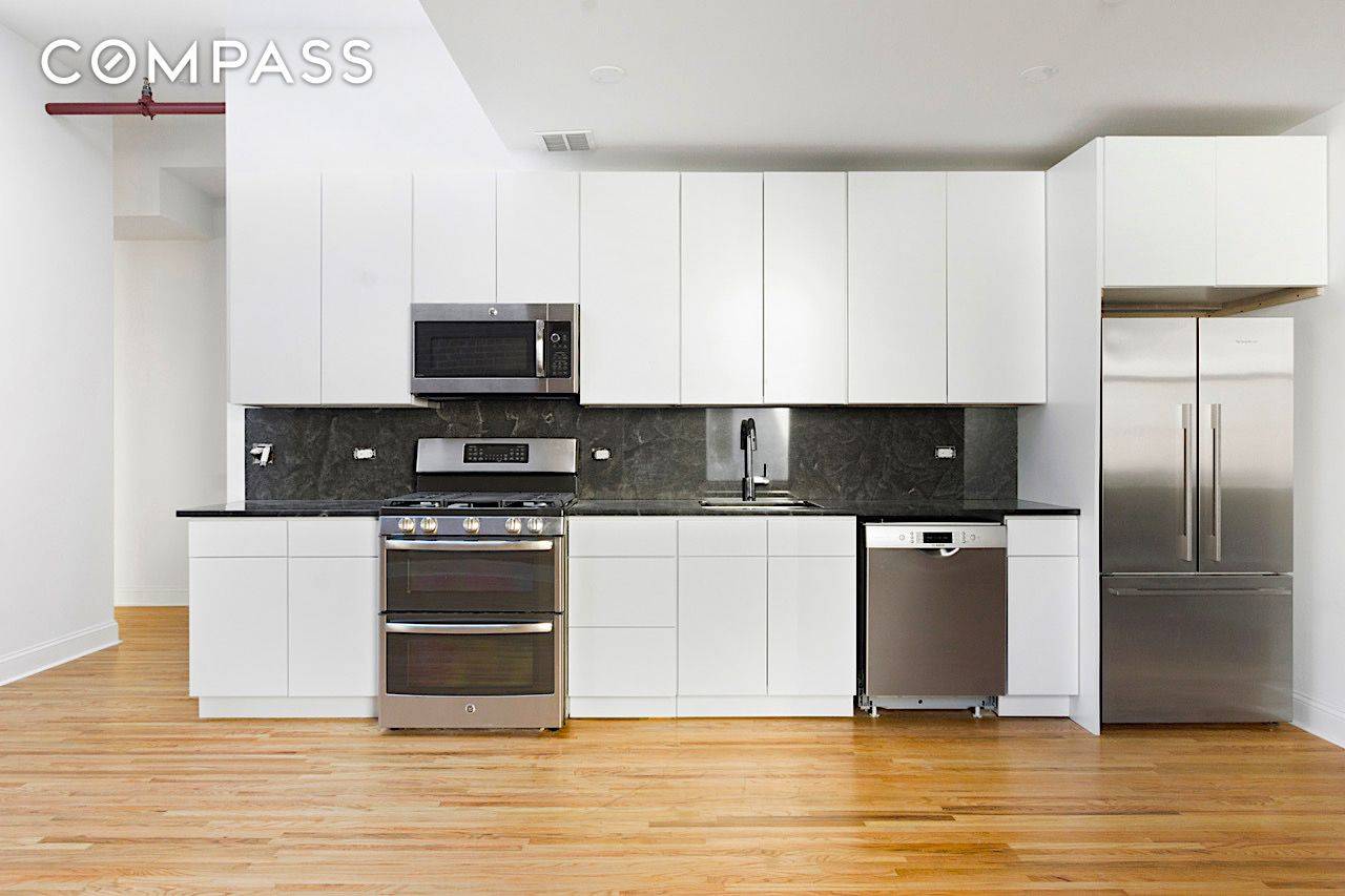 This is a gigantic 4 bedroom 2 full baths loft with all new renovations, an in unit washer and dryer, high ceilings, and a proper eat in kitchen with stainless ...
