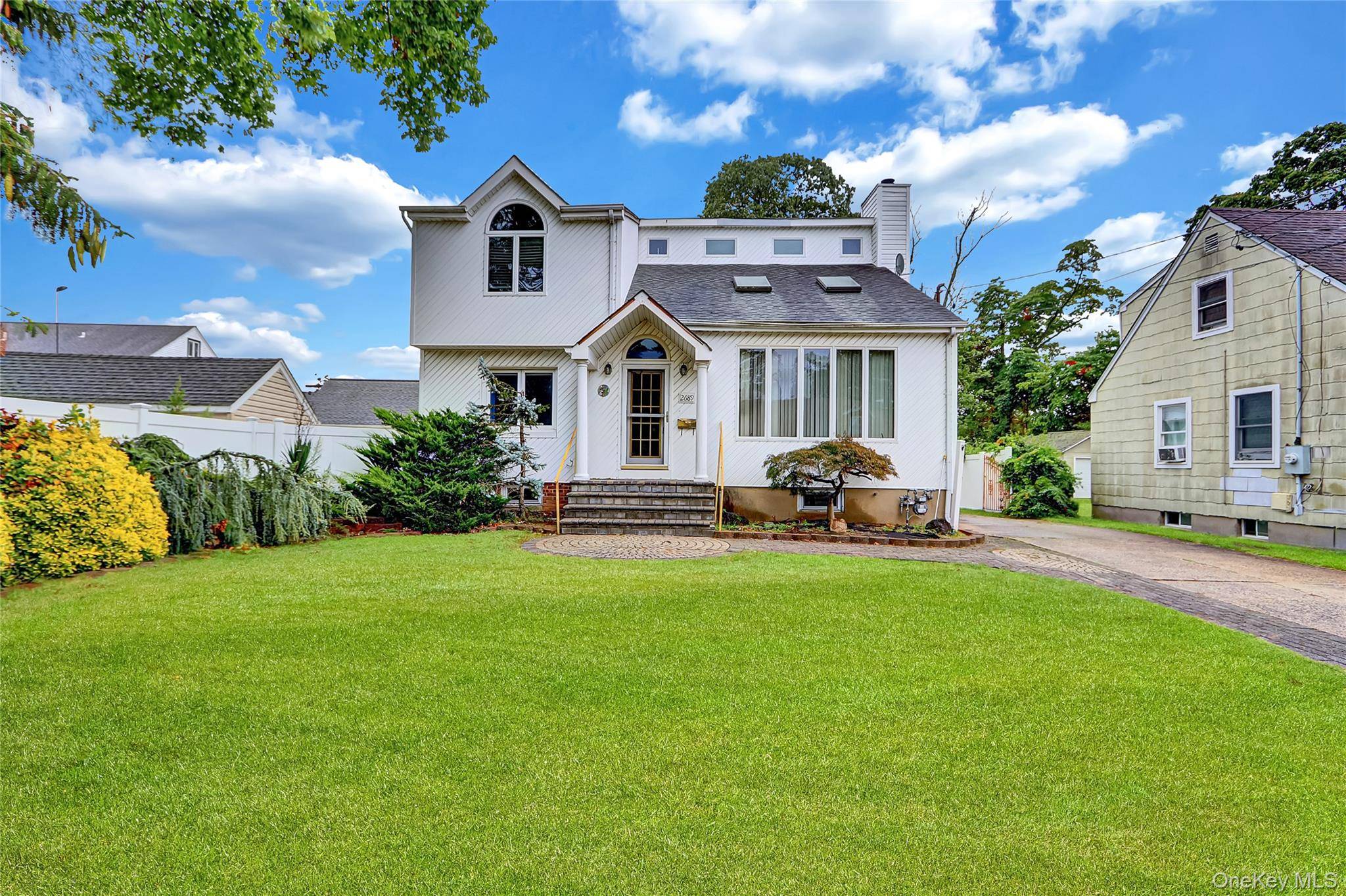 Great opportunity with this 4 bedroom, 3 bathroom Contemporary style home, featuring a full basement, detached 2 car garage, and a very deep rear yard.